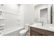 Bathroom featuring modern vanity with solid countertops and a bathtub with shower at 18180 E Tiffany Dr, Queen Creek, AZ 85142