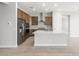 Modern kitchen featuring stainless steel appliances, a center island, and stylish cabinets at 18180 E Tiffany Dr, Queen Creek, AZ 85142