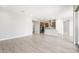 Bright living area showcasing open layout with tile flooring and kitchen views at 18180 E Tiffany Dr, Queen Creek, AZ 85142