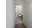 Clean bathroom with toilet, sink, and tiled floor at 1963 E Harness Ln, San Tan Valley, AZ 85140