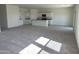 Open concept kitchen with island and granite countertops at 1963 E Harness Ln, San Tan Valley, AZ 85140