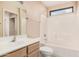 Neutral bathroom featuring a tub/shower combination, single sink vanity, and light fixtures at 19850 N 110Th Ln, Peoria, AZ 85373