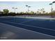 Community tennis courts with lighting for evening play at 19850 N 110Th Ln, Peoria, AZ 85373