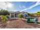 Expansive backyard featuring a sparkling pool and covered patio, perfect for entertaining at 20914 W Cora Vis, Buckeye, AZ 85396