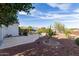 Scenic backyard with a pool and desert views under a bright blue sky at 20914 W Cora Vis, Buckeye, AZ 85396