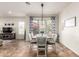 Well-lit dining space offers easy access to the living room at 20914 W Cora Vis, Buckeye, AZ 85396