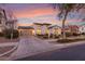 Charming two-story home boasts mature landscaping, a welcoming entrance, a two car garage, and solar panels at 20914 W Cora Vis, Buckeye, AZ 85396