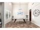 Bright game room features a ping pong table, high ceilings, and ample lighting at 20914 W Cora Vis, Buckeye, AZ 85396