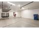 Spacious garage with ample storage racks and overhead storage system at 20914 W Cora Vis, Buckeye, AZ 85396