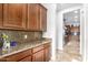 Kitchen area with ample counter space and dark wood cabinets at 20914 W Cora Vis, Buckeye, AZ 85396