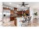 Gourmet kitchen features stainless steel appliances and custom cabinetry at 20914 W Cora Vis, Buckeye, AZ 85396