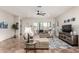 Bright living room with sectional couch, neutral tones, and modern furnishings at 20914 W Cora Vis, Buckeye, AZ 85396