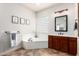Elegant bathroom featuring a soaking tub, and stylish fixtures at 20914 W Cora Vis, Buckeye, AZ 85396