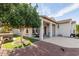 Covered patio area boasts an outdoor seating area and ceiling fans for comfortable outdoor living at 20914 W Cora Vis, Buckeye, AZ 85396