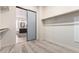 Walk-in closet with sliding mirrored doors and connection to the Primary bath at 20914 W Cora Vis, Buckeye, AZ 85396