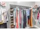 Large walk-in closet with ample shelving and hanging space at 2462 N Wrigley Dr, Florence, AZ 85132