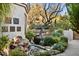 Relaxing water feature with landscaping and seating area at 24652 N 111Th Pl, Scottsdale, AZ 85255