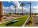 Artificial turf area with cornhole and benches at 2538 E Preston St, Mesa, AZ 85213