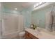 A well-lit bathroom with vanity and shower-tub combo at 2565 E Southern Ave # 102, Mesa, AZ 85204