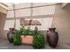 Entrance to Cottonwood Bar & Grill with desert plants at 26622 S Beech Creek Dr, Sun Lakes, AZ 85248