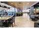 Spacious clubhouse dining area with modern decor and TV's at 26622 S Beech Creek Dr, Sun Lakes, AZ 85248