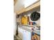 Laundry room with washer, dryer, and storage cabinets at 26622 S Beech Creek Dr, Sun Lakes, AZ 85248