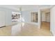 Bright living area with light wood floors, large windows, and an open floor plan at 26622 S Beech Creek Dr, Sun Lakes, AZ 85248