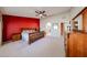 Main bedroom with large bed, wood furniture, and ceiling fan at 3358 N 147Th Ln, Goodyear, AZ 85395