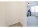 Bright bedroom with a large window, plush carpet, and a glimpse of the bed at 346 E Tahiti E Dr, Casa Grande, AZ 85122