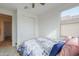 Bedroom with a window and a closet with sliding doors at 346 E Tahiti E Dr, Casa Grande, AZ 85122