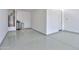 Epoxy floored garage with water heater and water softener at 346 E Tahiti E Dr, Casa Grande, AZ 85122