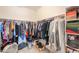 Organized walk-in closet with clothing racks, shelving, and ample storage space at 346 E Tahiti E Dr, Casa Grande, AZ 85122