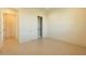 Minimalist bedroom with sliding closet doors, light tile flooring, and recessed lighting at 3643 E Coolidge St, Phoenix, AZ 85018