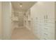 Spacious walk-in closet with custom shelving and ample storage at 3643 E Coolidge St, Phoenix, AZ 85018