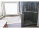Bathroom showing bathtub and shower in the bathroom that features double sinks at 4114 S Sawmill Rd, Gilbert, AZ 85297