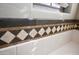 Bathtub with white subway tile and decorative accent at 4114 S Sawmill Rd, Gilbert, AZ 85297