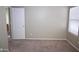 The bedroom has carpet and a window with a view at 4114 S Sawmill Rd, Gilbert, AZ 85297