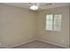 The bedroom has a ceiling fan and a window at 4114 S Sawmill Rd, Gilbert, AZ 85297