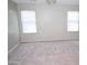 Bedroom showing carpet, neutral colors and large windows providing lots of natural light at 4114 S Sawmill Rd, Gilbert, AZ 85297