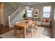 Inviting dining room with wooden table, pendant lighting, and cozy seating area at 4114 S Sawmill Rd, Gilbert, AZ 85297