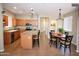 Spacious kitchen with stainless steel appliances, granite countertops, and breakfast nook at 4114 S Sawmill Rd, Gilbert, AZ 85297