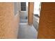 Covered porch featuring textured walls and decorative iron railing at 4114 S Sawmill Rd, Gilbert, AZ 85297