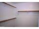 This walk-in closet has shelving and a hanging rod at 4114 S Sawmill Rd, Gilbert, AZ 85297