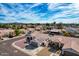 Aerial view of a residential neighborhood with houses and streets visible at 5003 W Davis Rd, Glendale, AZ 85306