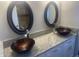 Bathroom with double vanity, granite countertops, and modern sinks at 5150 N 20Th St # 201, Phoenix, AZ 85016