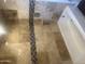 Clean bathroom featuring tile shower, tub, and neutral color palette at 5150 N 20Th St # 201, Phoenix, AZ 85016