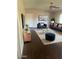 Virtually staged living room with navy blue sofa and copper accents at 5150 N 20Th St # 201, Phoenix, AZ 85016