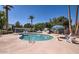 Inviting community pool with surrounding lounge chairs and barbecue area at 5150 N 20Th St # 201, Phoenix, AZ 85016