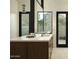 Contemporary bathroom featuring a double vanity, and sleek modern fixtures at 5327 N Invergordon Rd, Paradise Valley, AZ 85253