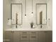 Elegant bathroom with double vanity, pendant lighting, and modern fixtures, towel and decor at 5327 N Invergordon Rd, Paradise Valley, AZ 85253